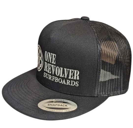 One Revolver Snapback Classic Flatbill Trucker HatUpgrade your surf style with the One Revolver Surfboards snapback hat. This sleek and versatile accessory features a classic snapback design adorned with the iconic One Revolver HatOne Revolver SurfboardsOne Revolver SurfboardsRevolver Snapback Classic Flatbill Trucker Hat