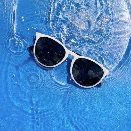 Hurricane - Matte Off White - Jett Lambert - Jet Black Polarized - One Revolver Surfboards